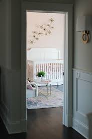 A Grey Hallway Painted In Benjamin Moore Classic Gray Leads To A Blush Pink Nursery Classic Bedroom Bedroom Colors Bedroom Paint Colors