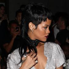 Let's not forget rihanna's infamous cfda dress either. Rihanna Brought Back Her Mullet Teen Vogue