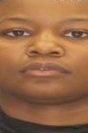 Deputies: Woman charged with murder after man found shot, killed in burning  home