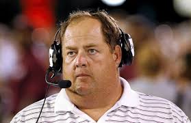 Jenks officials back coach