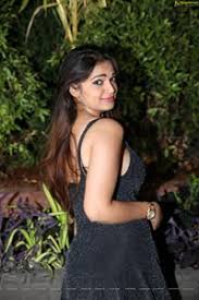 Ashwini photos in ragalahari : Hd Photos Ashwini In Black Mini Dress