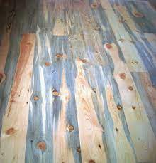 The wood has distinct areas of blue gray and white tones along with occasional bright blue or green streaks that are so vivid that wood appears to have been painted. Blue Stained Wood Google Search