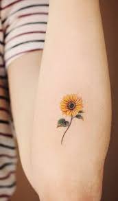 So Many People Like Sunflower Not Only Because Of Its Beauty But Also Its Implied In 2020 Sunflower Tattoo Sunflower Tattoo Simple Small Tattoos