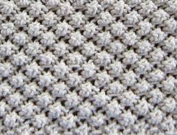 Created by increasing multiple stitches inside a single stitch and then immediately decreasing to pull in the ends, the popcorn stitch is enjoyable to knit and gives a pattern visual interest while keeping the. Knitting The Trinity Raspberry Stitch Types Of Knitting Stitches Trinity Stitch Knitting Stiches