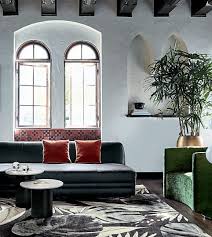 Luxe Lounger Long And Lean With A Deep Tight Seat Armless Sofa Marries Vintage And Modern Design With Its Rounded Silho Home Decor Black Leather Sofas Decor