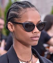 Cornrows or canerows are a style of hair braiding in which the hair is braided very close to the scalp, using an underhand, upward motion to make a continuous, raised row. Black Models With Cornrows At Fashion Week 2018