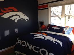Fun Way To Decorate A Child S Room Handmade Afigan On The Bed And Hand Painted Bronco On A Blue Backg Denver Broncos Bedroom Bedroom Decor Denver Broncos Room