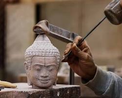 Cambodian artisans carefully crafting intricate silver jewelry.