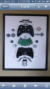 After Years Of Gaming Take The Favorite Controller That No Longer Works And Break It Apart In A Shadow Box For A Gift I Game Room Design Gamer Room Game Room