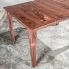 Stylish extending dining table with a white glass top and metal legs in white, graphite or silver finish. 1
