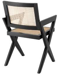 These solid wooden dining chairs are trendy and can fit into every decoration style. Casa Padrino Luxury Dining Chair Black Natural 53 X 57 X H 84 5 Cm Solid Wood Chair With Armrests And Hand Woven Rattan Luxury Dining Room Furniture
