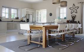 Dark iron dining chairs offer a vintage/industrial effect, while white upholstered chairs give your dining space a soft, welcoming feel. Industrialize Your Dining Room With Metal Dining Chairs