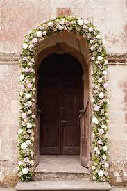 A Village Fete Elegant Pastel Inspiration For An English Spring Wedding Floral Garland Church Flowers Village Fete