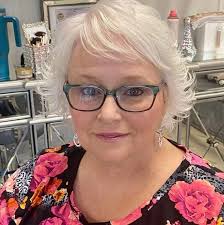 Embracing natural beauty with thinning hair and grey color