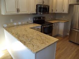 We offer over 30 different colors of granite in different edge finishes at very affordable prices we also offer our own line of stone countertops. Granite America Colonial Cream White Cabinets Granite America