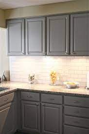 Check spelling or type a new query. 15 Subway Tile Backsplash Ideas To Beautify Your Kitchen White Subway Tile Backsplash Corian Countertops Grey Kitchen Cabinets