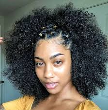 Use large rollers on damp hair to get maximum stretch, and when your hair is dry, make sure to comb through a hydrating serum to seal your ends. 25 Cute Natural Hairstyles For Black Women In 2021 Cute Natural Hairstyles Natural Hair Styles Natural Hair Styles Easy