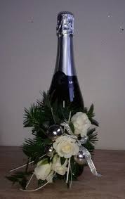 Check spelling or type a new query. A Lovely Gift Idea A Fresh Flower Arrangement On A Bottle Of Champagne Fresh Flowers Arrangements Flower Arrangements Wine Bottle Decor
