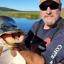 Ice fishing in Fairbanks, Alaska, with a recent catch
