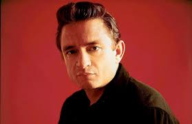 Johnny cash impersonates elvis presley (1959) the first time i saw elvis, singing from a flatbed truck at a katz drugstore opening on lamar avenue, two or three hundred people, mostly teenage girls, had come out to see him, wrote johnny cash in his autobiography, recalling meeting elvis presley in memphis. Johnny Cash The Man In Black A Stamp A Day