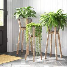 There's just something so charming about the slow days of farm life that helps us relax, enjoy every vintage aluminum pieces like funnels and pails are great for creating these unique planters. Farmhouse Rustic Planters Birch Lane