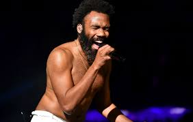 In addition to simply rolling the ball around, glover can slap, throw, bounce, and even ride atop the ball like a circus bear; Donald Glover Talks Potential Childish Gambino Plans And His Urges To Write A Bible