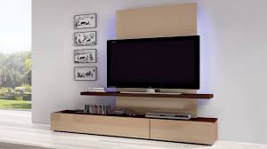 Instead of placing a shelf under the tv or even next to it, it is placed behind the tv. Living Room Wall Mounted Tv Cabinet Novocom Top