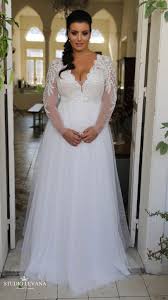 Luxurious crystal sweetheart lace flowers wedding dresses plus size princess wedding dresses 2019 heart crystal dress. Stunning Princess Plus Size Wedding Gown With Long Lace Sleeves And Tulle Skirt Tracie St Wedding Dress Material Plus Wedding Dresses Plus Size Wedding Gowns