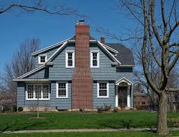 Picking blue exterior siding with red brick home keki. 1 426 301 Blue House Photos Free Royalty Free Stock Photos From Dreamstime