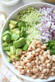 Broccoli Rice White Bean Summer Salad This Savory Vegan Recipe Summer Salads Vegan Summer Recipes Summer Bean Recipe