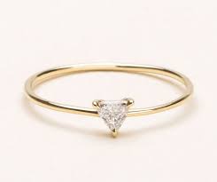 14 Minimalist Engagement Rings That Are Easy To Wear Every Day Minimalist Engagement Ring Geometric Engagement Ring Classic Engagement Rings