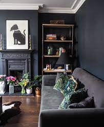 Dark 'floating' staircase at right matches accent tones throughout, including molding and door frames. 50 Favorites For Friday Design Matters Dark Living Rooms Apartment Interior Living Room Diy