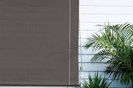 If you have dark bamboo window shades, but really want to lighten them up without spending a ton, you have to see how this blogger did hers! How To Make An Exterior Window Shade Coolaroo