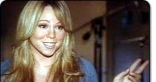 Mariah — back facing the music