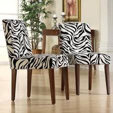 The alluria chandelier has a bold striking appearance, perfect in a variety of interior styles. Set Of 2 Black And White Zebra Print Dining Chairs