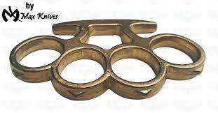 Cut from the finest brass plate available and precision crafted on state of the art cnc machinery, these brass knuckles paperweights exemplify american ingenuity with world class quality. Brass Knuckles Classic Brass With Pointed Tips