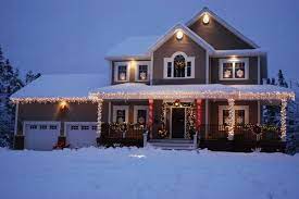 For a dynamic, engaging holiday display, drape these throughout the branches of front lawn trees. Wonderful Example Of Christmas Lighting For Two Story House With Wrap Around Porch Uploaded To Image House Outdoor Christmas Lights Christmas House Exterior
