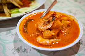 I think every family in malaysia has a version of this curry using the wonderful ready made curry powder or freshly prepared curry paste from the market. Udang Masak Lemak Nenas Restoran Nyonya Makko Flickr