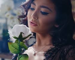 Just a few pics of @emily_juneee smelling a flower.