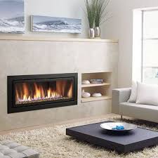 An electric modern fireplace can easily be inset in a wall. All About Gas Fireplaces Contemporary Gas Fireplace Fireplace Design Contemporary Fireplace