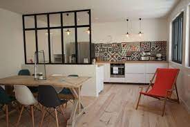 cuisine ouverte delimitee par une verriere ou un ilot bar home kitchens open plan kitchen living room kitchen living