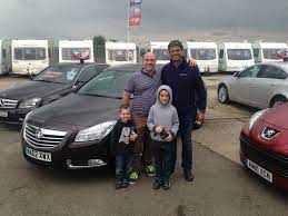 Mr Hunter From St Ives Cambs Collecting His 62 Reg Low Mileage Vauxhall Insignia Estate From Our Car Dealership Vauxhall Insignia Car Dealership Dealership