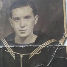This is my Father many many years ago. My mother asked if there's any way  we can restore this picture of him. Can anyone help please!?? Thanks in  advance!