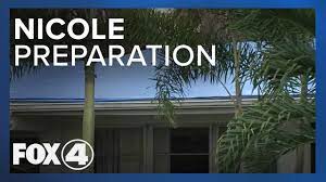 Fox 4 Advises to 'Check Your Tarps' as Nicole Gets Closer - YouTube