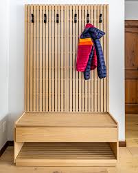 Now that's some coat storage 😍. The gorgeous design of this  @crateandbarrel entryway storage bench puts a smile
