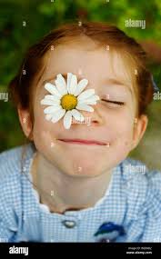 Girl with daisy flower
