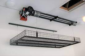 Installing overhead garage storage is a great way to gain storage space while sacrificing zero floor space. 15 Best Garage Ceiling Storage Lift Options In 2020 In 2021 Garage Ceiling Storage Ceiling Storage Overhead Garage Storage