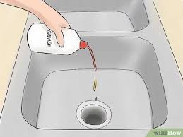 With the disposal and faucet turned off, put six ice cubes in the chamber followed by 1 tablespoon of baking soda, three thin lemon slices, and 1 teaspoon of bleach. How To Clean Your Garbage Disposal 12 Steps With Pictures