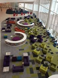 What Is A Library In Today S High Tech Age School Library Design Library Architecture Library Furniture