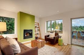 Bold shades of green and gold accents make this bedroom design vibrant and glamorous. 25 Green Living Rooms And Ideas To Match